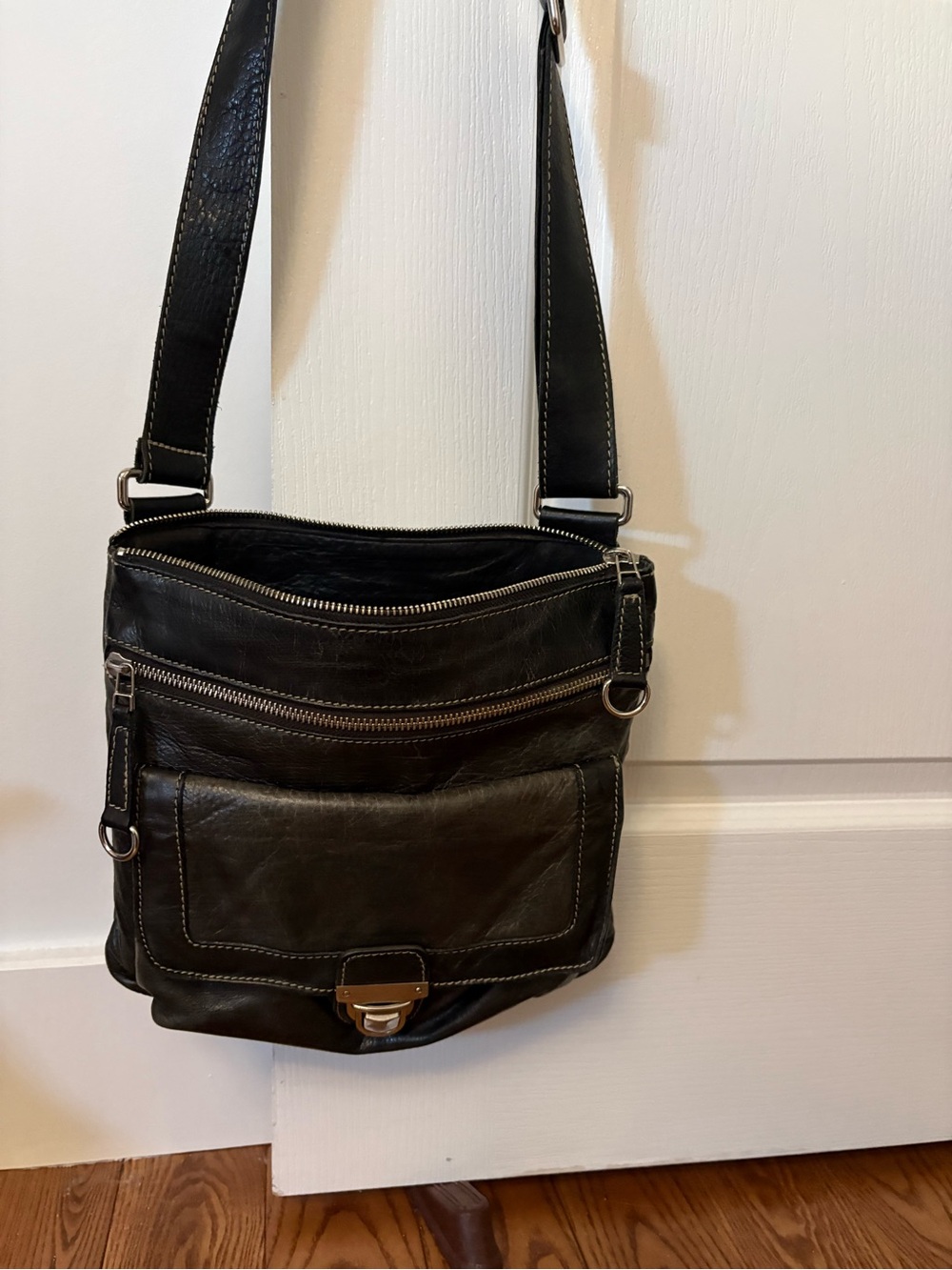 Roots Black Leather Messenger Bag with Silver Hardware